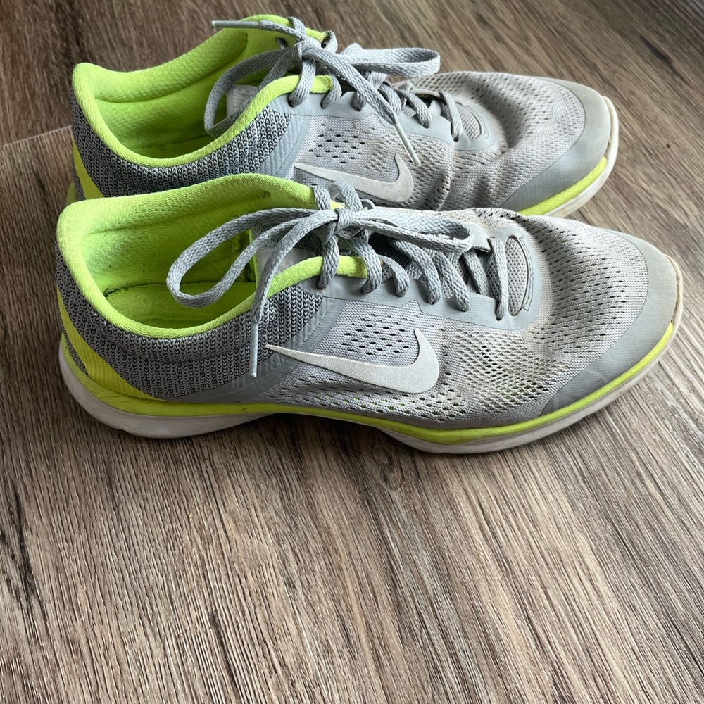 Nike running shoes, size 9. Grey and green lightly used.